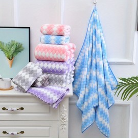 Three-color non-shedding coral fleece printed towel bath towel set absorbs water and dries hair for washing face, bathing and bathing.